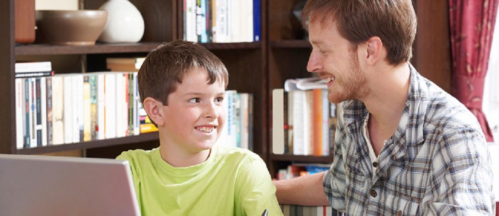 Boy Studying With Home Tutor Boy Studying With Home Tutor